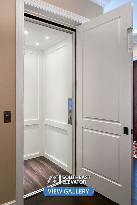 White Shaker style residential elevator with a touchscreen car operating panel and four LED lights Indoor Elevator Home, Home With Elevator, Residential Elevator Design, Home Elevator Ideas, Hidden Elevator In House, Residential Elevator Interior Design, Home Lifts Elevator, In Home Elevator, Lifts Elevator Home