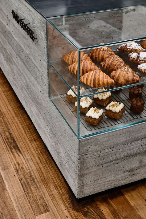 Image 10 of 26 of DUX COFFEE | Pierce Widera | Photograph by Derek Swalwell Coffee Shop Counter, Pottery Cafe, Cafe Display, Modern Coffee Shop, Pastry Display, Bakery Shop Design, Bakery Interior, Bakery Design Interior, Small Cafe Design