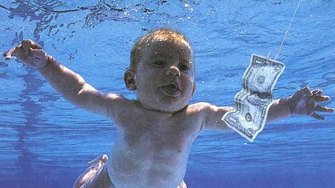 Image Credit: Nirvana Nevermind (Album Cover) | A lawsuit filed by Spencer Elden, the baby featured on the cover of Nirvana album ‘Nevermind’ has been dismissed by a US district judge. Nirvana Logo Wallpaper, Nirvana Album Cover, Marlon Brando James Dean, Nirvana Album, Nirvana Wallpaper, Nirvana Live, Nirvana Logo, Nirvana Music, Kathleen Hanna