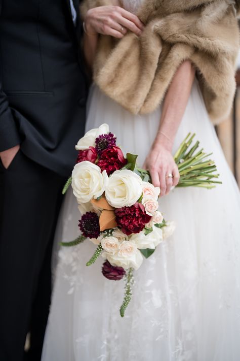 Burgundy peony, burgundy scabiosa, blush spray rose, white rose, lysimachia, magnolia, burgundy ranunculus bridal bouquet Blush Spray Rose, Burgundy Scabiosa, Ranunculus Bridal Bouquet, Burgundy Ranunculus, Burgundy Peony, Blush And White Wedding, Spray Roses, Wedding Bridal Bouquets, Ranunculus