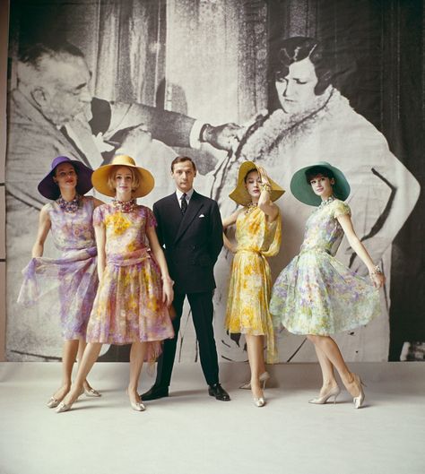 Dior creative director Marc Bohan with models from his first collection (Spring-Summer 1961), which was a great success. The prettiness and freshness of his Dior clothes gave an alternative to clients who wanted to be fashionable and look feminine yet feel safe. Bohan’s designs not only implied and flattered the body but never dared to expose or reveal. (Jardin d’Italie, Jardin de Paris, Jardin d’Espagne, and Jardin Anglais dresses, Spring-Summer 1961 haute-couture collection.) Marc Bohan, Dior Collection, Rock N’roll, French Fashion Designers, Dior Fashion, Dior Couture, Ringo Starr, 1960s Fashion, Miss Dior