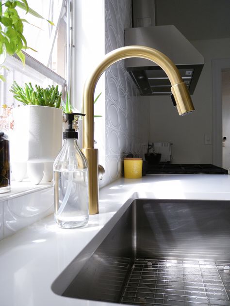 We love this brushed brass faucet from Newport Brass. Brooklyn Kitchen, Gold Faucet, Brass Kitchen Faucet, Stainless Sink, Black Kitchen Faucets, Newport Brass, Brown Kitchens, Stainless Steel Sink, Brass Kitchen