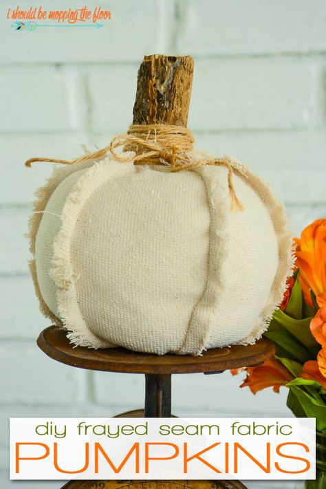 These easy fabric pumpkins have fun, outward frayed seams that give them a vintage, rustic look. They're simple to make and budget-friendly, too. Frayed Fabric Pumpkin, Easy Fabric Pumpkins, Prim Pumpkins, Cloth Pumpkins, Autumn Projects, Pumpkin Tutorial, Pumpkin Patterns, Thanksgiving Decorating, Fall Pumpkin Crafts