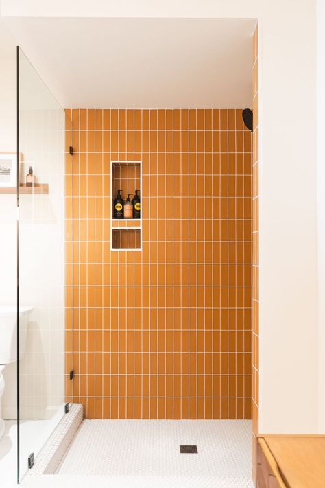 Vertical Subway Tile Shower Ideas, Shower Niche Ideas, Elegant Backsplash, Subway Tile Showers, Accent Tiles, Niche Ideas, Orange Tiles, Orange Bathrooms, Yellow Tile