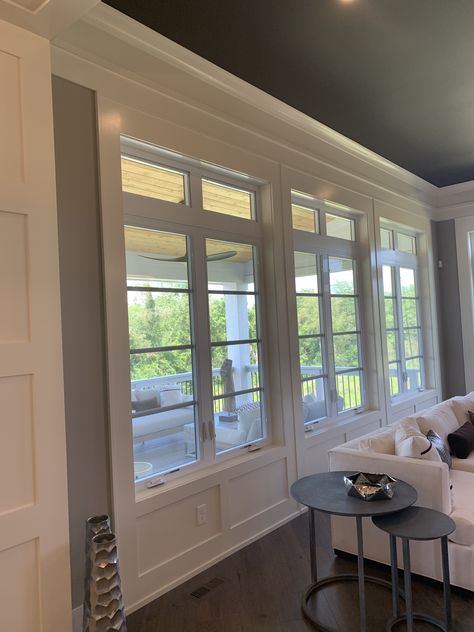 Wainscoting around windows in great room Window Trim With Wainscoting, Wainscoting Ideas Around Windows, Wainscotting Around Windows, Wainscoting Window Wall, Wainscoting Under Window, Wainscoting With Windows, Panelling Around Windows, Framing Around Windows, Paneling Around Windows