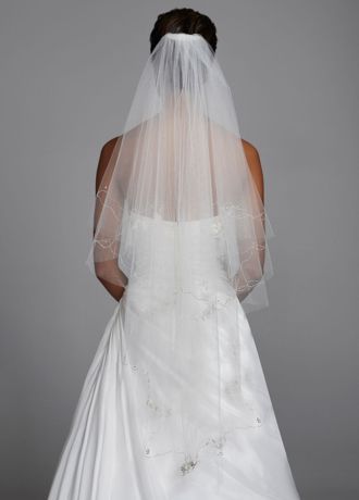 Make your walk down the aisle one for the books in this absolutely beautiful veil!  Veil fatures flower motif and cut edge.  Pairs beautifully with any wedding dress but made for Style CPK512.  Available in Ivory and White.  Measures 30"/45"L x 60"W.   Imported. Fingertip Length Wedding Veil, Elbow Length Veil, Fingertip Wedding Veils, Disney Princess Wedding, Bridal Veils And Headpieces, Wedding Veils Short, Waterfall Wedding, Veil Headpiece, Veil Styles