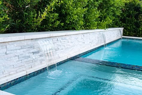 Planter box wall next to pool Pool With Back Wall, Raised Pool Wall Tile Ideas, Pool With Cascade Wall, Pool With Planter Wall, Pool Walls Ideas, Pool Sheer Descent Wall, Pool Against Wall, Pool With Waterfall Wall, Pool Fountain Wall