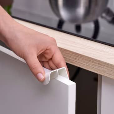 These $2 IKEA Pulls Transform Dated Cabinets (with No Tools!) | Apartment Therapy Dated Cabinets, Diy Cabinet Handles, Cabinet Handles Kitchen, Tea Tree Oil Uses, Minimal Traditional, Ikea Cabinet, Kitchen Bohemian, Before After Kitchen, Ikea Products