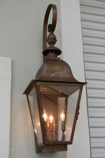 Handcrafted with high quality copper, the Quebec design evokes tradition and charm.  Price reflects lantern as shown with Top Finial and Top Scroll.   Available in Gas Flame - Call us directly (Contact information below), or click on "Have a question" and send us a note for details. Mounting options available:  Wall Mo Carriage Lights, Football Top, Tower Light, Cottage Lighting, Copper Lantern, Exterior Light Fixtures, Gas Lanterns, Gas Lights, Lantern Wall