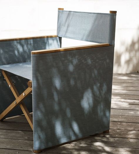 The ORSON 002 is a foldable outdoor armchair by RODA with structural Canatex fabrics that dress its sides, providing glimpses of the solid teak structure underneath. Chic Outdoor Furniture, Teak Garden Furniture, Beach Furniture, Contemporary Armchair, Outdoor Hammock, Outdoor Living Rooms, Directors Chair, Outdoor Pouf, Outdoor Armchair