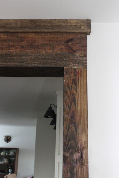 I love the look of exposed wood beams and the little punch of rustic that they give.  But big, chunky, REAL, SOLID WOOD beams are not so wallet-friendly. As it always does, our renovation ran higher than we hoped and being thrifty is always a goal.  So, real wood beams that were pretty and perfect … Door Frame Molding, Rent House, Faux Wood Beams, Faux Beams, Rustic Window, Revere Pewter, Rustic Doors, Exposed Beams, Window Trim