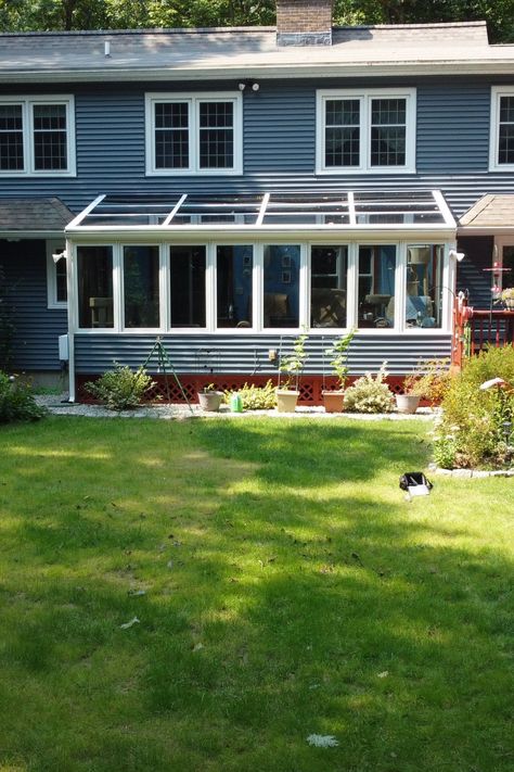 This beautiful sunroom in Colchester, CT, has been a peaceful retreat for over 20 years! Featuring wall-to-wall windows and a stunning glass roof, it offers perfect views of the lush green backyard. Our team at Creative Enclosures has maintained and upgraded it to ensure it's just as beautiful as the day it was completed. Find inspiration for your next sunroom project with us!  #SunroomDesign #GlassRoof #HomeRetreat #NatureViews #CreativeEnclosures #ColchesterCT #SunroomInspiration Sunroom Inspiration, Four Season Sunroom, Green Backyard, Sunroom Designs, Home Re, Design Installation, Sunrooms, Glass Roof, Four Season