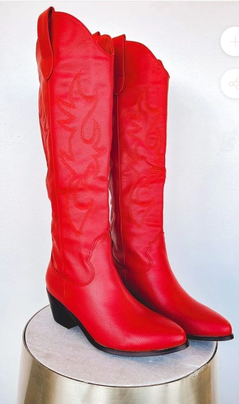 Add a touch of Western charm to your shoe collection with these knee-high boots from Billini. The vibrant red colour and intricate embroidery make these vegan leather boots a stylish addition to any outfit. The pointed toe and block heel provide both comfort and style, perfect for autumn, winter, summer or spring. Featuring a pull-on closure and made with synthetic outsole material, these Billini Urson boots are both durable and trendy. The boots are a UK size 6 / US size 8 / EU size 39 and showcase a cowboy and cowgirl theme. These boots are perfect for women looking for a fashionable shoe that will turn heads. Vegan Leather Boots, Boots Knee High, Intricate Embroidery, Red Colour, Cowboy And Cowgirl, Boots Knee, Western Cowboy Boots, Western Cowboy, Vibrant Red