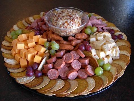 Use plant stands to put platters on for cupcakes deli meats, cheese, etc for different levels of serving food at a party. Cracker Tray Ideas, Cheese And Cracker Platter, Cheese And Cracker Tray, Meat Tray, Cracker Tray, Meat And Cheese Tray, Cocktail Tray, Meat Trays, Holiday Platters