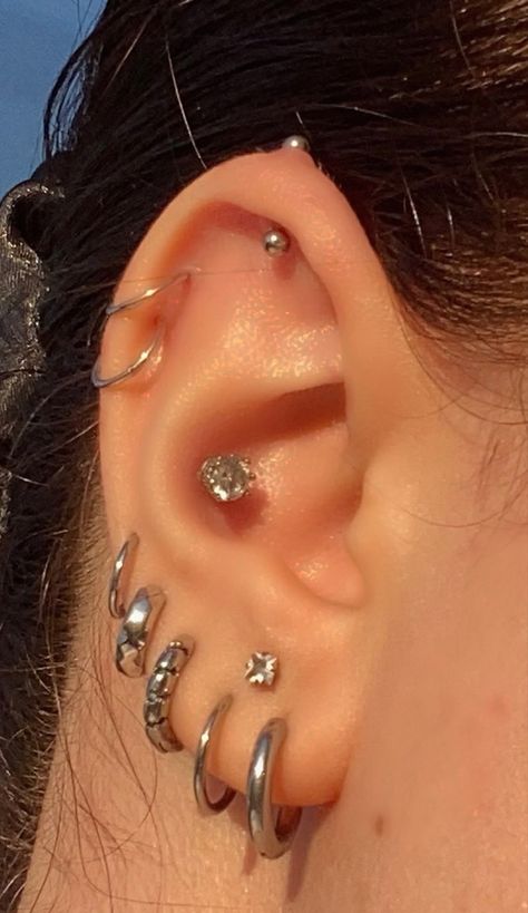 Crazy Piercings Body Mods, Ear Covered In Piercings, Cute Ear Jewelry, Ear Piercing Set Up Goth, Unique Ear Piercings Creative, Stacked Helix Piercings, Full Pierced Ear, 4 Ear Lobe Piercings, Piercing Inspo Silver