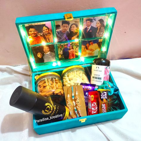 Rakhi hamper for bhai & bhabhi 👫 Includes 👇 🔸2 dry fruits jars 🔸Rakhis 🔸Denver deo for bhai 🔸Body shop shower gel for bhabhi 🔸Some chocolates 🔸2 scrunchies 🔸Light ,photos 🔸Text on top can be customised Dm for more info ✅Hampers can be further customised as per your requirements and budget [ Rakhi hamper, rakhi, gift box , trunk hamper , gift for bhai , rakhi gift ideas ] #rakhi2024 #rakhihamper #hampers #rakhi #giftforbhai #delhi #bangalore #pune #bihar #jaipur #udaipur #canada #gu... Gift Ideas For Bhabhi, Gift For Bhabhi, Customised Gift Ideas, Rakhi Gift Ideas, British Rose, Rakhi Gift, Hamper Gift, Dry Fruits, Udaipur