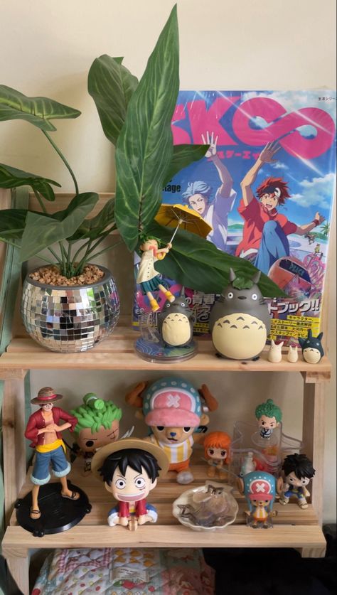 One Piece Manga Shelf, Anime Figures Aesthetic Room, Ponyo Room Decor, One Piece Room Ideas, Anime Decor Bedroom, Yotsuba Core, One Piece Bedroom, One Piece Room Decor, One Piece Decor