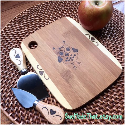 Woodburned cheese board with utensils at SueMadeThat.etsy.com IG: suemadethat2 FB: Suemadethat4u Crow Pyrography, Wood Burned Sunflower Table, Wooden Spoons Burned Mushroom, Wolf Pyrography, Wolf Wood Burning, Pyrography, Wood Burning, Cheese Board, Cheese