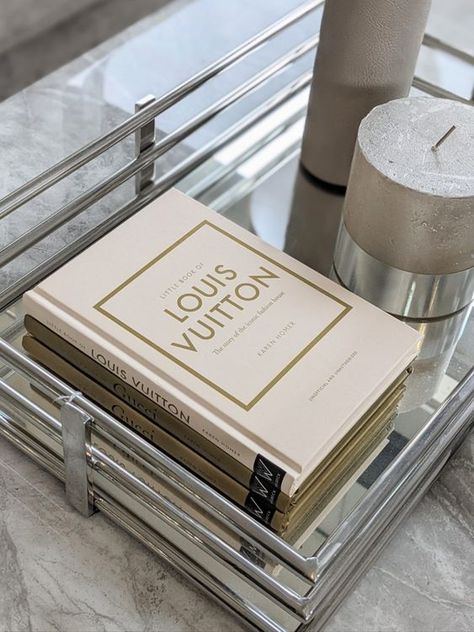 Louis Vuitton, book, decoration, home,  living room, amazon finds Louis Vuitton Book Decor, Louis Vuitton Coffee, Philly Apartment, Prada Book, Fashion Followers, Louis Vuitton Book, Louis Vuitton Monogram Bag, Luxurious Fashion, Swinging Sixties