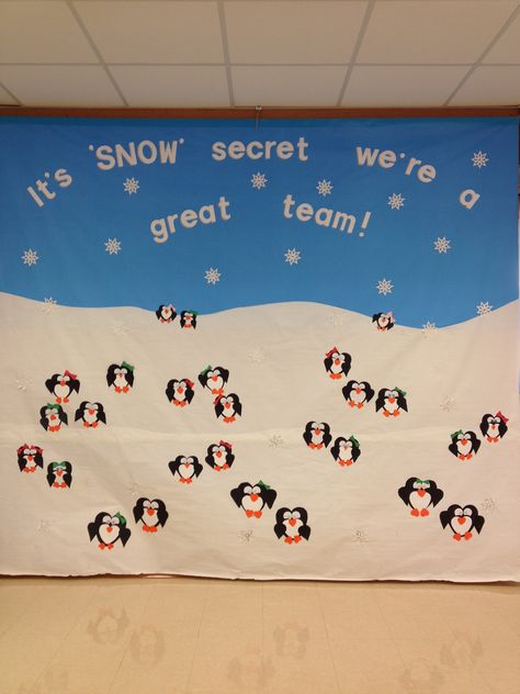 It's "SNOW" secret we're a great team!  Winter bulletin board/banner: 8' high and 10' wide. This was hung in our cafeteria during winter months. Back drop is made from blue and white butcher paper taped together from the back. Clear shipping tape works great because of its width. Students made the penguins. Antartica Bulletin Board, Winter Staff Bulletin Board, Penguin Winter Bulletin Boards, Employee Bulletin Board Ideas, Team Bulletin Board, School Captain, Staff Bulletin Boards, Fox Room, Family Bulletin Boards