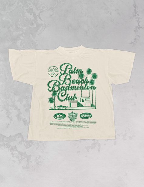 Join the Palm Beach Badminton Club in this vintage style oversized sweatshirt! - Features Palm Beach Badminton Club with 93 in a crest underneath and a description of the sport below it all in a green ink - Screen print transfer that is heat pressed onto each tshirt - Tshirt is a super soft vintage wash that gets softer after each wash - Oversized fit - Sizing translation: XS/S = L , S/M = XL , L/XL = 2XL , 2XL/3XL = 3XL - 100% Cotton - Model is 5'9 wearing a size 2XL/3XL **due to screens & filters color may vary from pictures** Retro Shirts Vintage Graphic Tees, Club Tshirt Designs, Beach Badminton, Vintage T-shirt, Club Shirt Designs, Japanese Tshirt Design, Style Oversized Sweatshirt, Sports Shirt Design, Club Tshirts