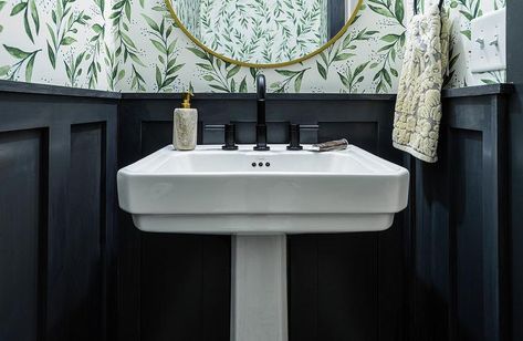 A white pedestal sink is contrasted with a matte black faucet and fixed in front of a black board and batten wall finished with green botanical wallpaper. Bathroom Design With Wallpaper, Pedestal Sink Ideas, Powder Room Pedestal Sink, Dark Stained Wood Floors, Blue Powder Rooms, Black Powder Room, Staining Wood Floors, Room Wallpaper Designs, Rectangular Vessel Sink