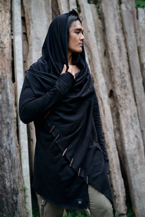 "VALO KENOBI Obsidian Black \"Every jedi is an offspring of a great master\" An elegant jedi styled cloak hoodie. A truly multifunctional hooded cloak made from extremely soft and durable 100% high quality cotton. Multiple button attachment variations enable you to adjust the look of this hoodie to suit different occasions. Use it open as a stylish and elegant cardigan, or close it up for a hooded bedouin look. You can go with many variations! Special thumb holes in the end of the sleeves. COLOU Jedi Clothing, Black Jedi, Post Apocalyptic Clothing, Jedi Robe, Apocalyptic Clothing, Button Hoodie, Lance Mcclain, Designer Kurta, Urban Ninja