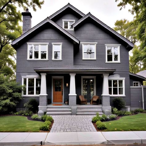 40 Modern Grey House Exterior Color Schemes and Ideas Grey White Exterior House Colors, Slate Grey House Exterior, Color Schemes For Exterior Of House, Gray House Exterior White Trim, Dark Grey Stucco House Exterior, Painted Gray Brick House Exterior, Dark Grey Exterior House Colors, Modern Grey House Exterior, Dark Grey House Exterior