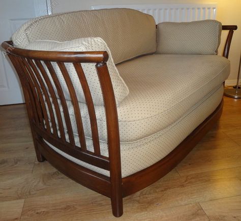 lovely ercol renaissance low back medium size 2 to 3 seater sofa settee with curved solid ash steam bent golden dawn frame with the original zip off ercol upholstered fabric cushion covers finished in a neutral pale cream with dot pattern Ercol Chair Upholstery, Ercol 203 Sofa, 1960 Furniture, Ercol Teramo Bed, Ercol Sofa Forli, Fabric Cushion Covers, Ercol Sofa, Country Farmhouse Table, Ercol Furniture