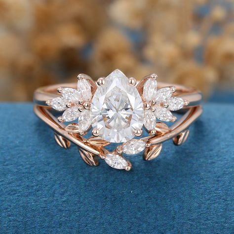 1-0-ct-pear-shaped-moissanite-cluster-bridal-set-7 Pear Moissanite Engagement Ring, Detailed Engagement Ring, Moissanite Engagement Ring Solitaire, Unique Bands, Engagement Rings Bridal Sets, Types Of Diamonds, Cluster Engagement Ring, Curved Wedding Band, Bridal Bands