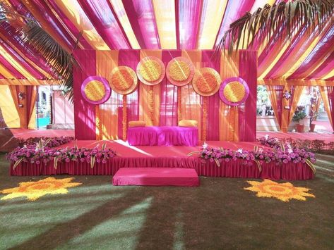 #mehendi #function #stage #decor #pink #yellow #theme #flowers #me_momentoevents Kirtan Decoration, Mehndi Background, Haldi Backdrops, Wedding Night Room Decorations, Indian Wedding Decorations Receptions, Mehendi Function, Indian Wedding Theme, Reception Stage, Mehendi Decor Ideas