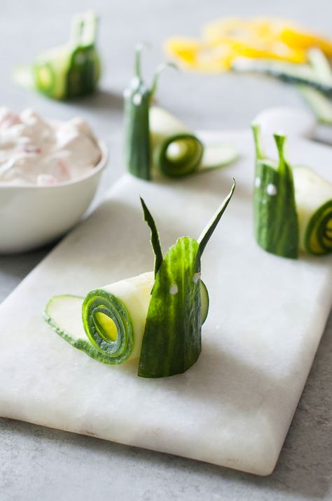 Cucumber Snails and Garden Vegetable Dip Healthy Snack Recipe for Kids by Handmade Charlotte | Pin Cheerfully Curated By #HandmadeCharlotte for #PeterRabbitMovie Dip Healthy, Healthy Snack Recipe, Vegetable Dip, Recipe For Kids, Decorações Com Comidas, Food Art For Kids, Handmade Charlotte, Garden Vegetable, Vegetable Carving