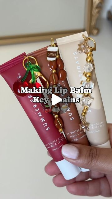 Aman on Instagram: "Making my favorite lip balms into key chains✨  @summerfridays   Which one is your favorite?   inspo: @j.xnah 🫶🏽 #lipbalm #summerfridays #lipbutter #lipbalmkeychain #diy" Lip Balm Organization, Lip Balm Charms Diy, Lipgloss Holder Keychain Diy, Chapstick Keychain Diy, Lip Balm Keychain Aesthetic, Diy Lip Gloss Keychain, Summer Fridays Lip Balm Keychain, Lipgloss Keychain Diy, Lipgloss Charms Diy