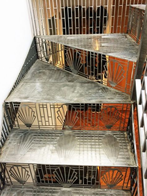 Perforated Stairs, Art Deco Railing, Bachelor House, Art Deco Staircase, Art Deco Stairs, Art Deco New York, Stair Chandelier, Stair Elevator, Stair Art