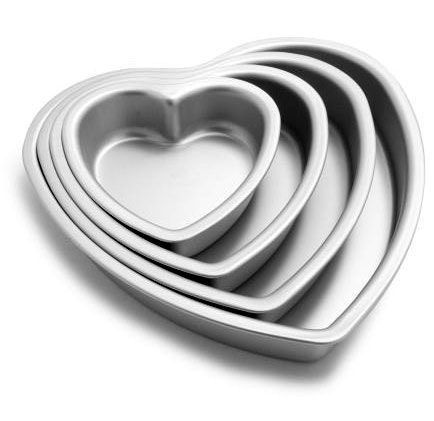 Don't Go Breaking My Heart: Heart-Shaped Tools & Bakeware | Kitchn Heart Cake Pan, Heart Shaped Cake Pan, Cupcake Mold, Heart Shaped Cakes, Baking Utensils, Valentines Day Cakes, Wilton Cakes, Heart Cake, Brownie Cake