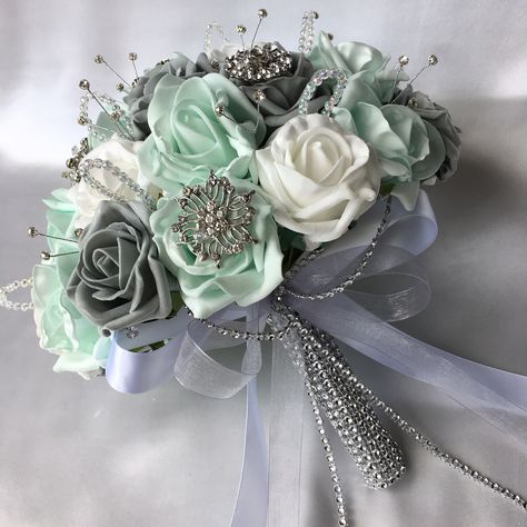 Brides Posy Bouquet in Mint Green, Grey and White Roses with Diamantes and Brooches. #flowers #bridesposy #artificialweddingposy… Mint Green And Grey Wedding, Grey Wedding Decorations, Green And Grey Wedding, Grey Wedding Decor, Posy Bouquet, Teardrop Bouquet, Mint Green Flowers, Artificial Wedding Flowers, Wedding Mint Green