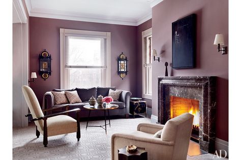 At a Boston residence devised by Thad Hayes, the master sitting area includes a 1950s cocktail table attributed to Jules Leleu from Maison Gerard. Jewel Tone Paint Colors, Jewel Tone Living Room, Feminine Interior Design, Mauve Walls, Boston House, Paint Color Inspiration, Interior House Colors, Purple Interior, Purple Rooms