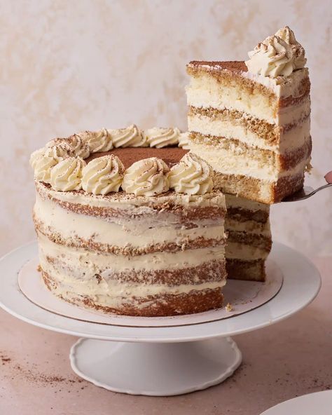 This Tiramisu Cake recipe is for a delicious tiramisu layer cake, which takes all the flavors of traditional tiramisu and makes a perfect celebration cake or birthday cake for coffee lovers. Layers of genoise sponge cake soaked in espresso and amaretto and stacked with mascarpone cream and a dusting of cocoa powder. It tastes just like authentic tiramisu but is beautiful to slice into and serve at parties or dinner parties. A really impressive dessert recipe and showstopper! Tiramisu Design Ideas, How To Make Tiramisu Cake, Non Traditional Birthday Cake Ideas, Tiramisu Layer Cake, Birthday Tiramisu, Genoise Sponge Cake, Authentic Tiramisu, Amaretto Recipe, Traditional Tiramisu