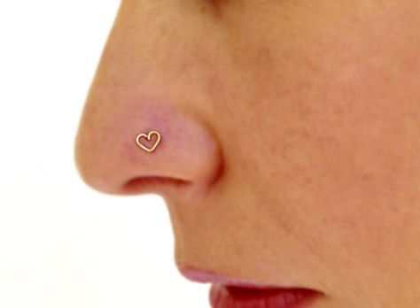 Gold heart nose ring from etsy Heart Shaped Nose Stud, Gold Heart Nose Stud, Heart Nose Piercing, Heart Nose Ring, Cute Nose Rings, Heart Nose Rings, Cute Nose Piercings, Piercing Inspo, Heart Piercing