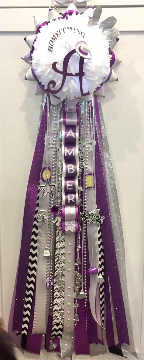 Drill Team Homecoming Mum in Purple, White, Silver and Black Purple Homecoming Mum, Purple And White Mums Homecoming, Drill Team Homecoming Mum, Drill Team Mums Homecoming, Purple Mums Homecoming, Big Homecoming Mums, Purple Mums, Senior Overalls, Homecoming Corsage