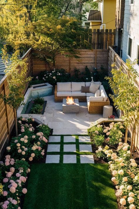 Backyard garden with a cozy seating area around a fire pit, surrounded by flowers and greenery. All Patio Backyard, Yard Garden Ideas Small, Small Slanted Backyard Ideas, Town Home Backyard Ideas, Oasis Yard Ideas, Tony Backyard Ideas, Small Backyard Retreat, Small Grass Backyard Ideas, Amazing Small Backyards