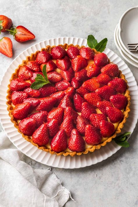 This French Strawberry Tart (Tarte aux Fraises Classique) combines a buttery sable pastry with silky smooth vanilla pastry cream custard. Topped with fresh strawberries coated in a sweet marmalade glaze, this classic tart recipe is the ultimate dessert straight out of a pastry shop. Vanilla Pastry Cream, French Tart, Marmalade Recipe, Cream Custard, Strawberry Tart, Tart Shells, French Dessert, Tart Recipe, Pastry Cream