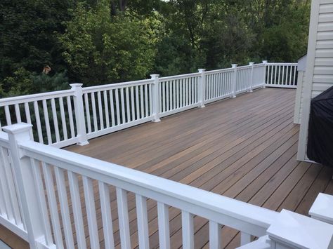 Timber tech tigerwood composite decking with hidden fasteners Timber Tech Tigerwood Deck, Timber Tech Deck Colors, Timber Tech Deck Ideas, Deck With White Railing, White Deck Railing, Timber Tech Deck, Timber Balcony, White Railing, Deck Addition