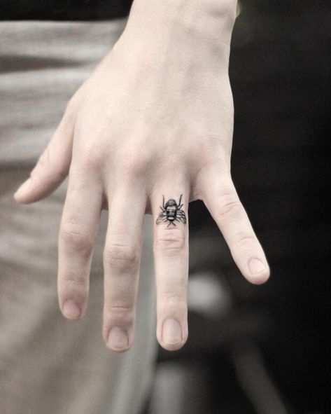 Small bee tattoo on the ring finger by Alex Bee Tattoo Finger, Wasp Tattoo, Small Bee Tattoo, Honey Bee Tattoo, Tattoo Finger, Ring Finger Tattoos, Finger Tattoo Designs, Tattoo Designs For Girls, Bee Tattoo