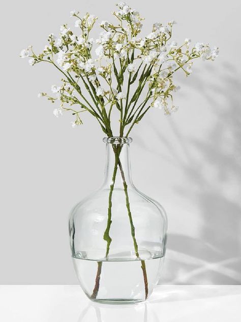 Simple yet beautiful clear glass vase; great for long stemmed floral arrangements. Measures 10" tall. Beautiful with eucalyptus, hydrangeas, olive branches or give it a coastal vibe with large frawns. Stunning centerpiece for a coffee table, dining table or large kitchen island. #affiliate Anthropologie Diy, 2020 Bedroom, String Lights Inside, Glass Bottle Vase, Slim Neck, Plants Art, Coffee Table Centerpieces, Garden Vases, Olive Branches