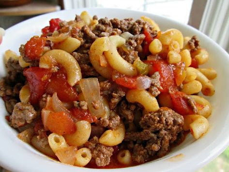 Try Mom's Goulash! You'll just need 1/2 lb macaroni, 1 1/2 lbs ground beef, 1 large onion, diced, garlic salt, pepper, chili powder, & hot sauce to taste, 2... Old Fashioned Goulash, American Goulash, Goulash Recipes, Pot Pies, Stewed Tomatoes, Minced Meat, Goulash, Italian Seasoning, Pasta Dishes