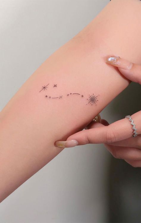 star tattoo, star tattoos, star tattoo designs, star tattoo ideas, star tattoo on arm, star tattoo on hand Star Tattoos With Quotes, Wishing On A Star Tattoo, Stars Aligned Tattoo, Arm Star Tattoo, Star Shopping Tattoo, Tattoo Ideas Star, Star Tattoo Ideas, Connecting Tattoos, Small Compass Tattoo