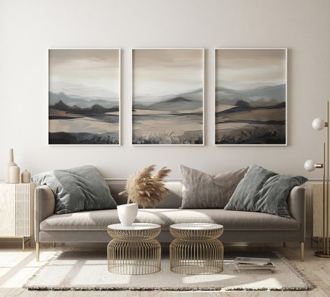 "Enhance the beauty of your walls with our exquisite Wall Decor Set of 3. This art landscape painting DIGITAL DOWNLOAD set features stunning abstract landscape wall art pieces that will add a touch of elegance and style to any room in your home. The set includes three unique pieces that can be displayed together as a cohesive collection or separately to create a captivating focal point in different areas of your home. Whether you want to spruce up your living room, bedroom, or office, this Wall Decor Set of 3 is a perfect choice to elevate your interior decor to new heights. Highlights: - Set of 3: This Wall Decor Set includes three beautiful art landscape paintings, offering versatility in how you display them. - Abstract Landscape Wall Art: The paintings feature abstract interpretations Living Room Art Ideas Above Couch, Paintings Behind Sofa, Living Room Wall Decor Ideas With Photos, Wall Art Above Fireplace Ideas, Modern Mountain Art, Art Above Sectional, Art For White Walls, Behind The Sofa Wall Decor, Behind Sofa Wall Decor