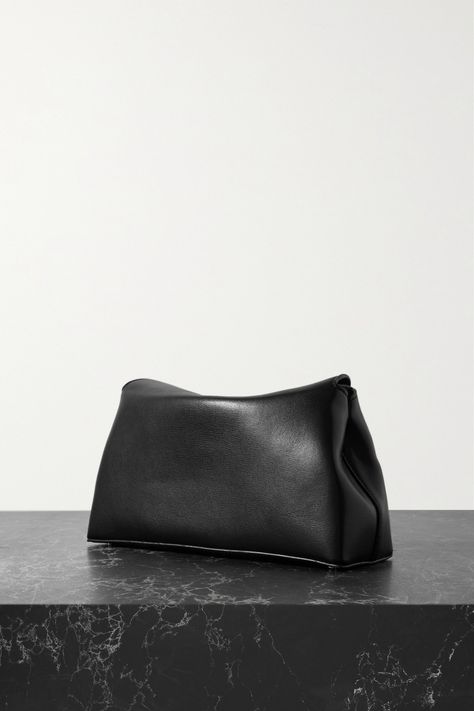 Find TOTÊME T-lock Leather Clutch on Editorialist. You can consider TOTEME's 'T-Lock' clutch an all-rounder - it works with smart and casual outfits alike. Made from leather, the compact accessory opens to reveal space for the essentials and has gold hardware, including the protective feet at the base. Leather Clutch Bags, Gold Branding, Leather Flats, Leather Clutch, Compact Design, Leather Top, Leather Working, Pebbled Leather, Gold Hardware