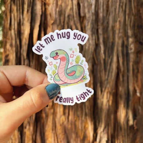 Swamped in the never-ending grind? This sticker's a nudge to hit pause and hug it out--because nothing says 'I survived another meeting' like a sticker squeeze. Slap it on and feel the love, one snake-y embrace at a time. 🌟 Includes one (1) premium vinyl sticker. 🌟 Waterproof, weatherproof, and scratch resistant. 🌟 Each sticker is securely packaged in a protective sleeve for safety when it's shipped to you. ✨ Thick Premium Vinyl Finn's stickers are printed on premium vinyl with a permanent ad I Hug You, Little Doodles, New Sticker, Hug You, Sticker Collection, Cute Doodles, Waterproof Vinyl, Funny Stickers, You Really